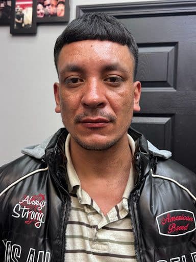 Carlos — barber at The Dominicans Barbershop