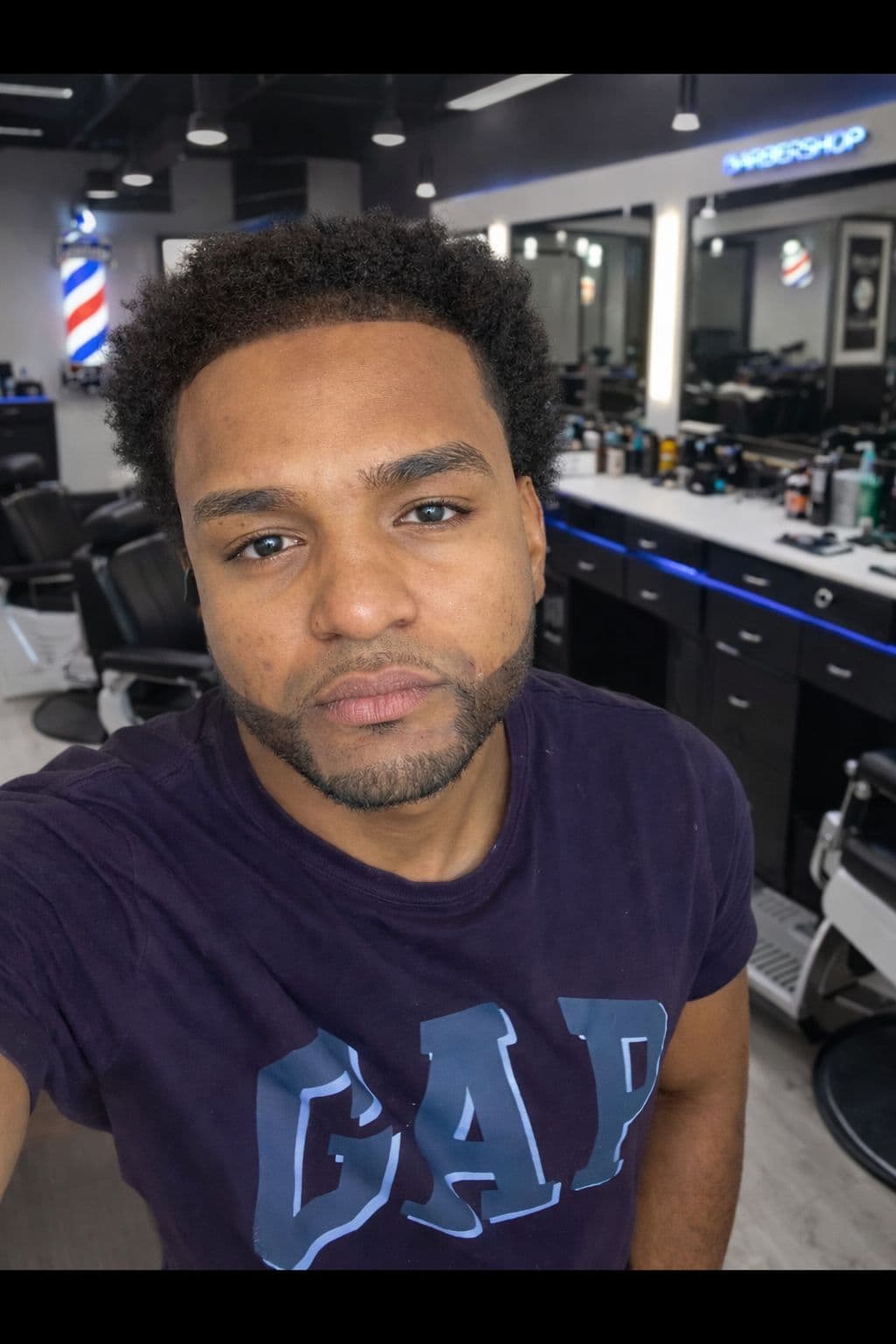 Cris — barber at The Dominicans Barbershop