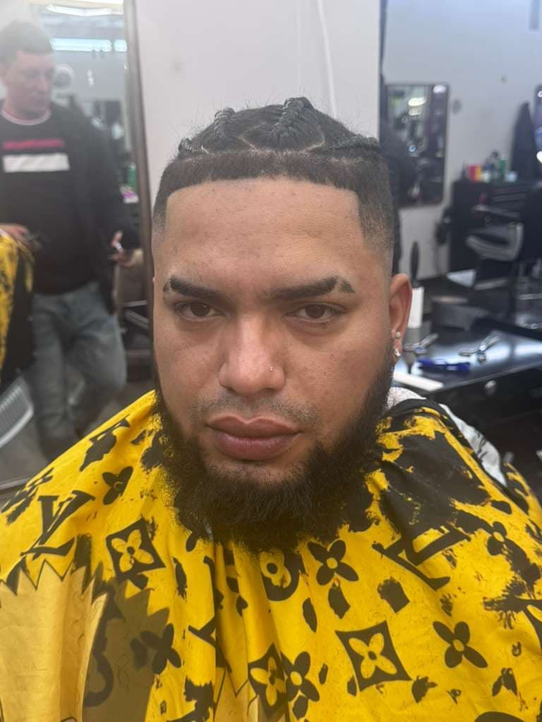 Jonathan — barber at The Dominicans Barbershop