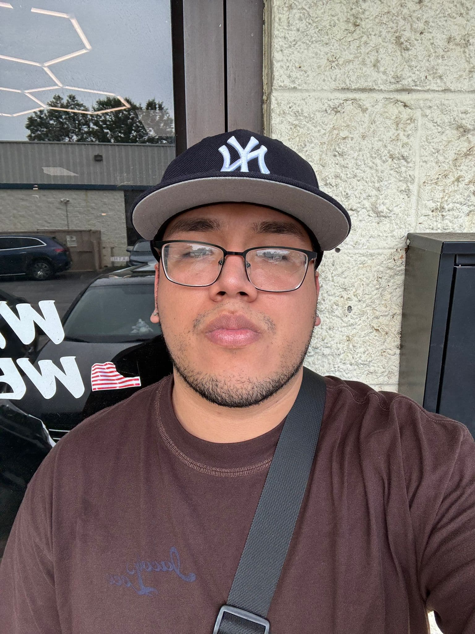 Dennys — barber at The Dominicans Barbershop