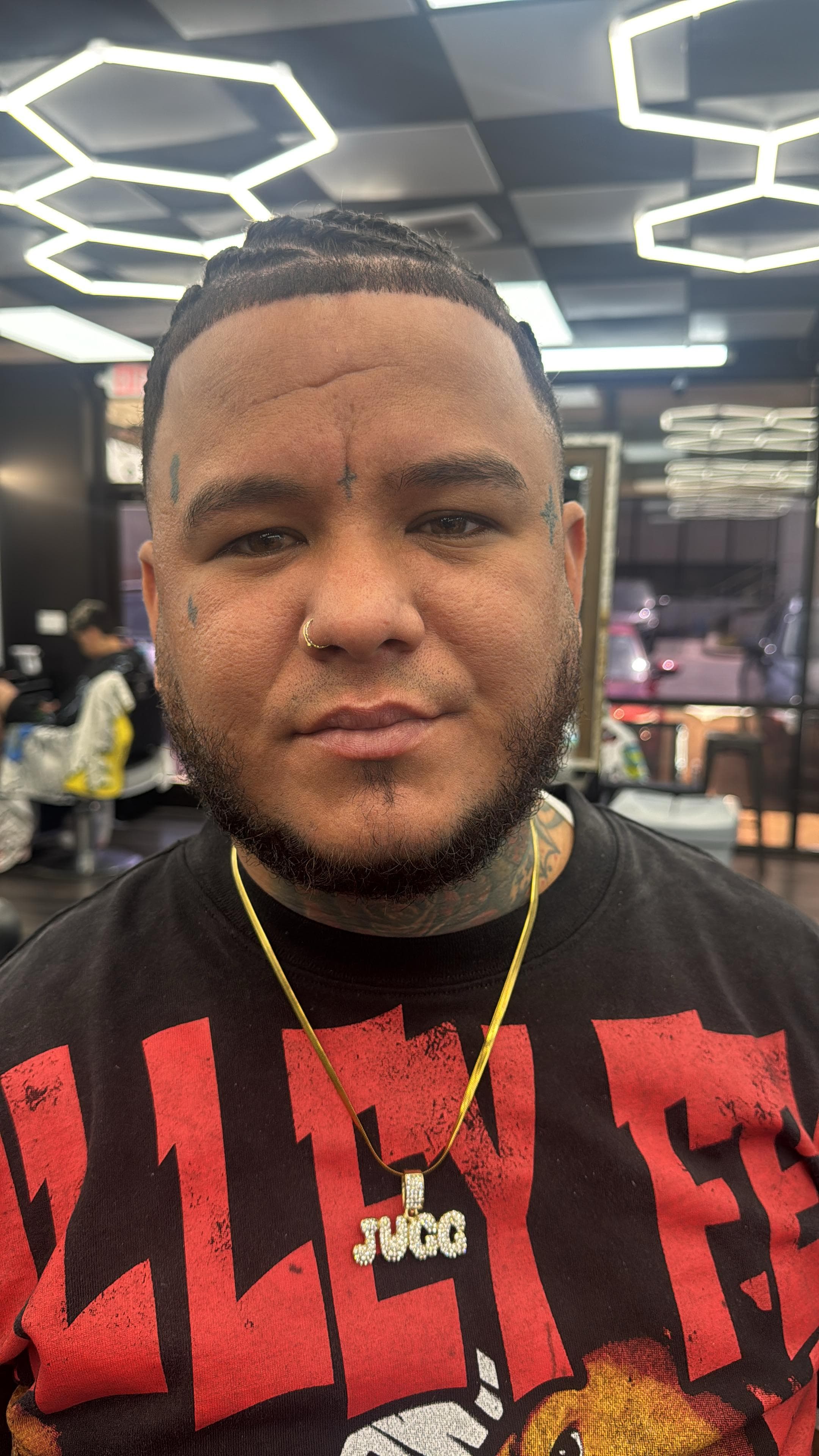 Jose — barber at The Dominicans Barbershop