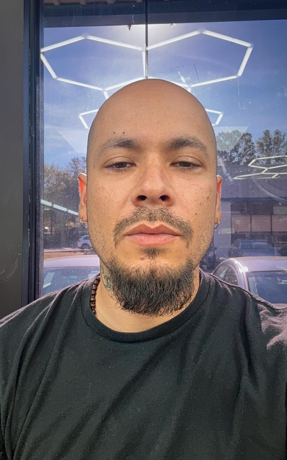 Enzo — barber at The Dominicans Barbershop