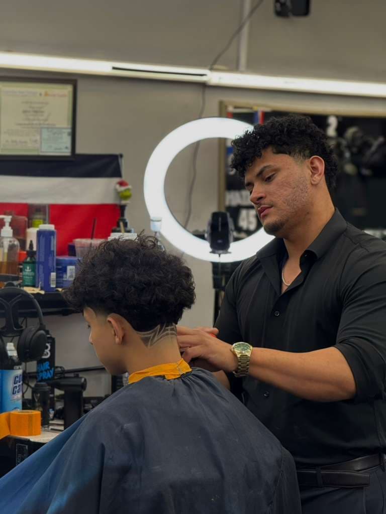 Manopla — barber at The Dominicans Barbershop